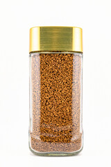 can of instant freeze-dried coffee, roasted to a golden hue, with a gold lid