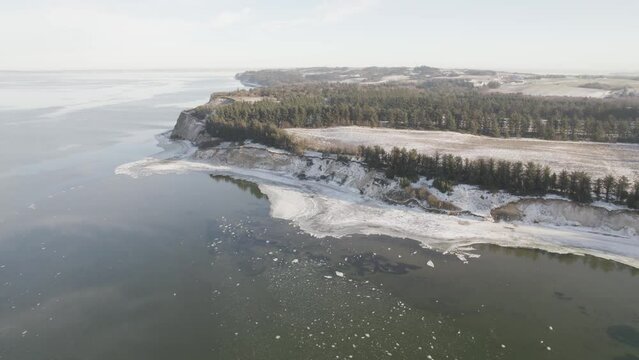 Aerial Shot of Snow-Covered Limfjord Shore of one of the Danish Island
