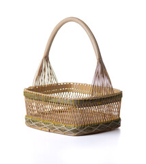 Obraz premium Woven wooden basket, isolated on white background