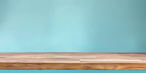 Minimal empty natural wood table top, counter top. Brown tabletop with copy space for product advertising mockup, blue wall, kitchen interior details