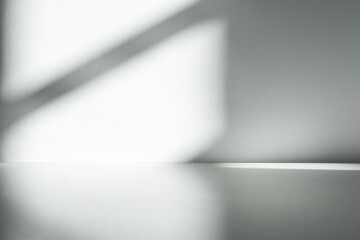 Wall interior background, studio and backdrops show products.with shadow from window color white and grey. background for text insertion and presentation product	