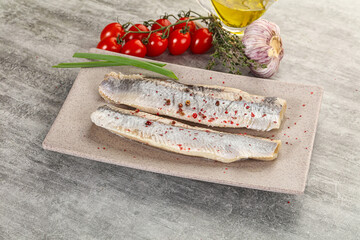 Marinated herring fillet with green onion