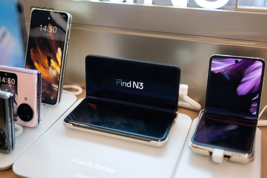 OPPO Find N3 demo display at store. Modern mobile phone technology concept.