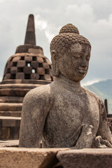 Fototapeta na wymiar Buddha statue in Borobudur Temple, Java Island, Indonesia.