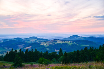 Wasserkuppe Rhön - panoramic view from the Radom observatory on the Wasserkuppe in the Hessian Rhön in summer towards Fulda in the sunset, Hessen, Germany