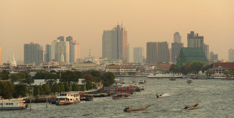 Obraz premium Aerial view of Bangkok Downtown Skyline with Chao Phraya River, Thailand. Financial district and business centers in smart urban city in Asia. Skyscraper and high-rise buildings.