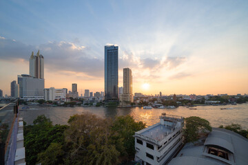 Aerial view of Bangkok Downtown Skyline with Chao Phraya River, Thailand. Financial district and...