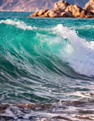 Tuinposter Rough emerald waves on the coast. © two K