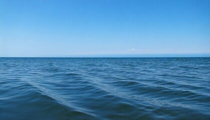 Obraz premium Waves of the open sea under the blue sky. horizon
