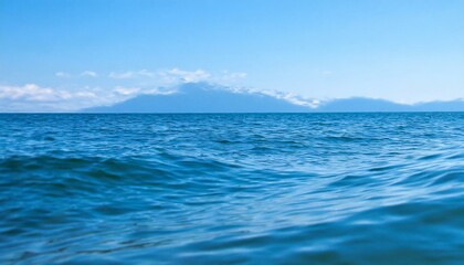 Fototapeta premium Waves of the open sea under the blue sky. horizon