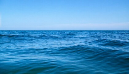 Fototapeta na wymiar Waves of the open sea under the blue sky. horizon