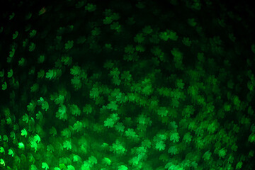 Abstract green background with clover highlights. Spring, summer background, st. Patricks day