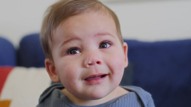 Baby boy with bookers in his nose