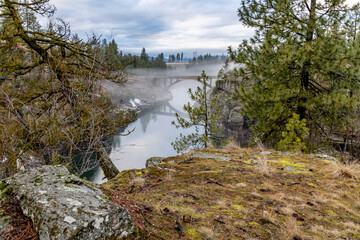 Bridge in the Fog Over the Spokane River at Falls Park, Post Falls, Idaho.