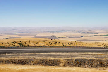 Beautiful summer landscape with a bird's eye view of the hills and mountains in Oregon, USA, on a sunny day.