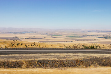 Beautiful summer landscape with a bird's eye view of the hills and mountains in Oregon, USA, on a sunny day.