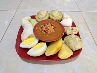 Siomay is a typical Indonesian food made from cabbage, potatoes, eggs, bitter melon and tofu boiled in peanut sauce