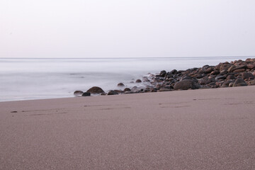 Stones on beach in the morning