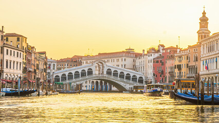 Panoramic view of famous Canal Grande with famous Rialto Bridge at sunset, Venice - 728270935
