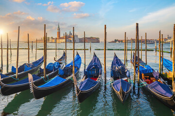 Venice cityscape and canal with gondolas - 728270980