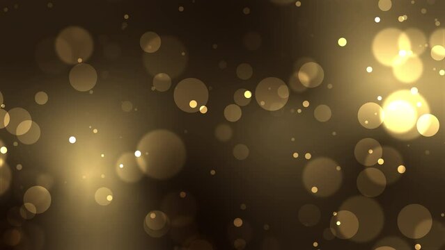 Gold Bokeh Background Animation. Looping animated lens light leaks bokeh background with a shiny golden particle effect. Suitable for text backdrop or message video background. Features 4K and Looped