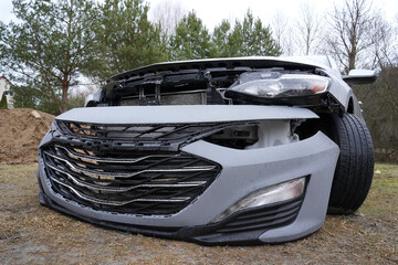 damaged front bumper of the car