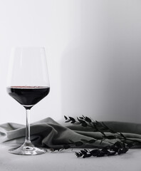 Glass of red wine on stone