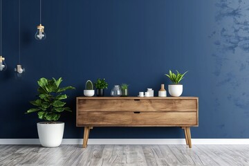 Chest of drawers in the living room with blue wall. Copy space interior background