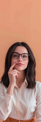 Young female teacher isolated from a peach color background