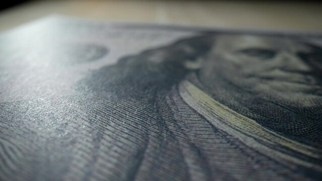 Macro view of crisp 100 USD dollar bills, an epitome of American currency excellence. Stocks and economy concept. Paper money Background. 4K HDR.
