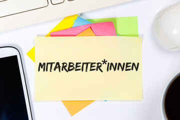 Gendern am Beispiel Mitarbeiter Mitarbeiter*innen mit Gendersternchen als Symbol für...