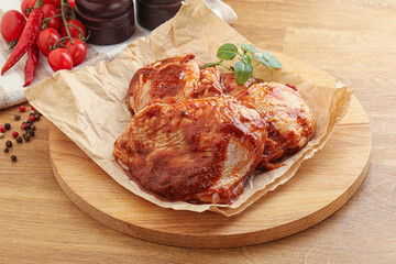 Marinated chicken leg in tomato sauce