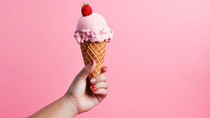 Foto auf Alu-Dibond Hand holding strawberry ice cream cone isolated © wiparat