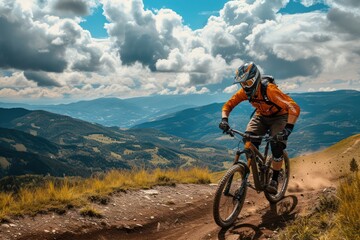 Fototapeta na wymiar Mountain biker riding downhill in the mountains. 