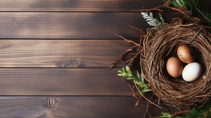 Nest with easter eggs on wooden background