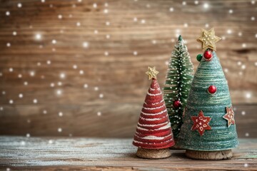 This is a photograph of three handmade craft Christmas trees on a wood background 