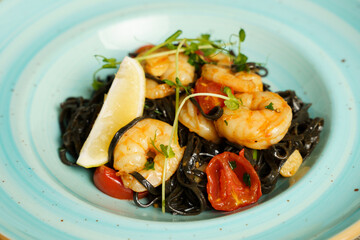 Black tagliatelle pasta with shrimp, chili and garlic