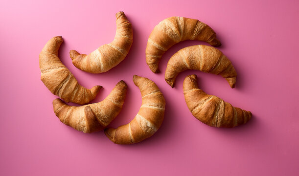 Studio Shot Of Homemade Croissants On Pink Background