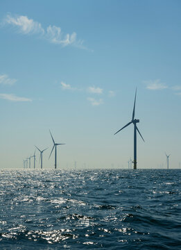 Netherlands, Zeeland, Domburg, Sky over offshore wind farm in North Sea