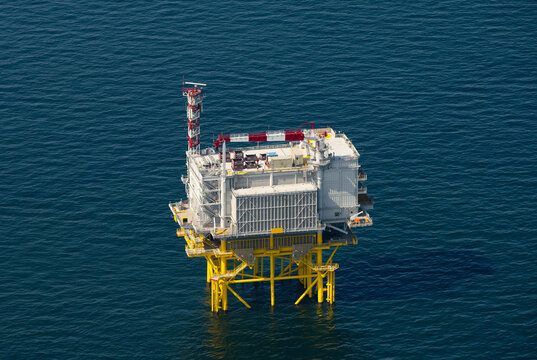 Netherlands, North Holland, IJmuiden, Aerial view of electricity substation of newly constructed offshore wind farm in North Sea