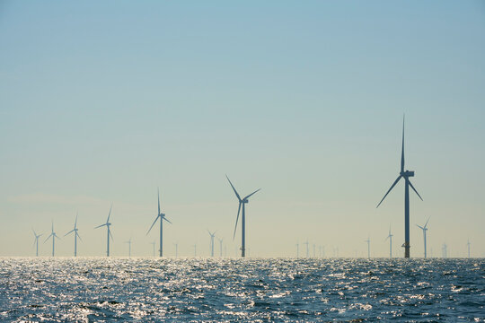 Netherlands, Zeeland, Domburg, Sky over offshore wind farm in North Sea