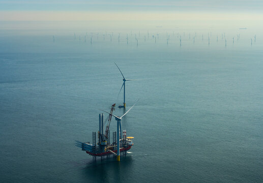 Netherlands, North Holland, IJmuiden, Aerial view of wind turbine installation vessel at offshore wind farm