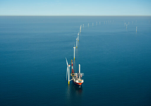 Netherlands, North Holland, IJmuiden, Aerial view of wind turbine installation vessel at offshore wind farm