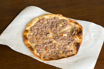 Lahm bi ajeen meat pie, Middle Eastern flatbread and ground beef meat
