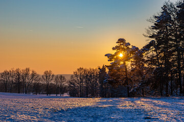 Winter landscape at cold evening. Czech Republic.
