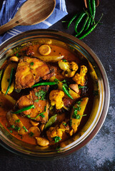 Katla Fish Curry with Seasonal Vegetables cooked in a traditional Bengali style