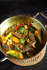Koi Fish Curry with Seasonal Vegetables cooked in a traditional Bengali style