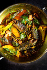 Koi Fish Curry with Seasonal Vegetables cooked in a traditional Bengali style