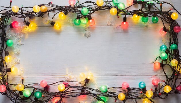 christmas lights garland border over white background flat lay copy space