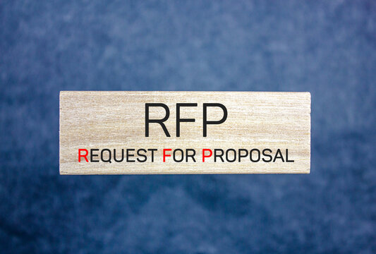RFP Request For Proposal, inscription, text on a wooden block. RFP concept.